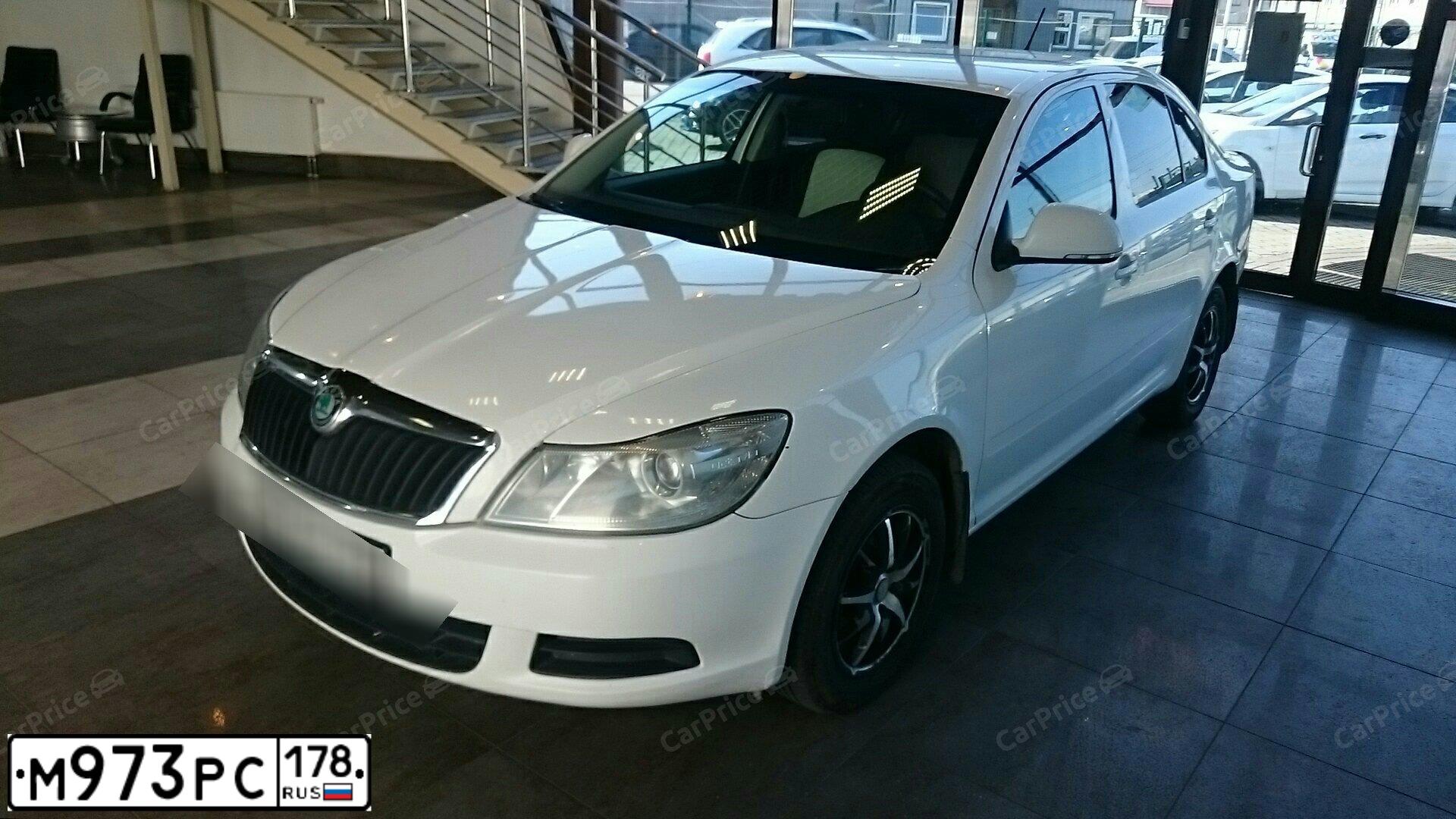 Фото автомобиля SKODA OCTAVIA, 2012 — госномер М973РС178. Цвет: Белый