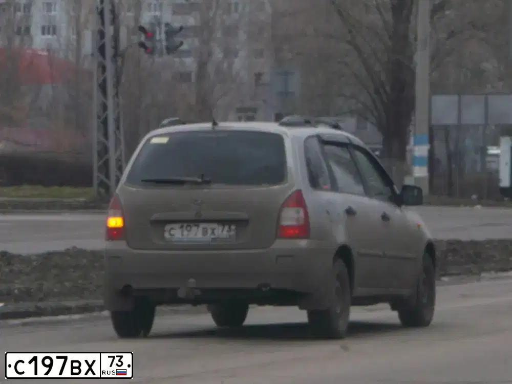 Фото автомобиля LADA 1117 KALINA, 2010 — госномер С197ВХ73. Цвет: СЕРЫЙ