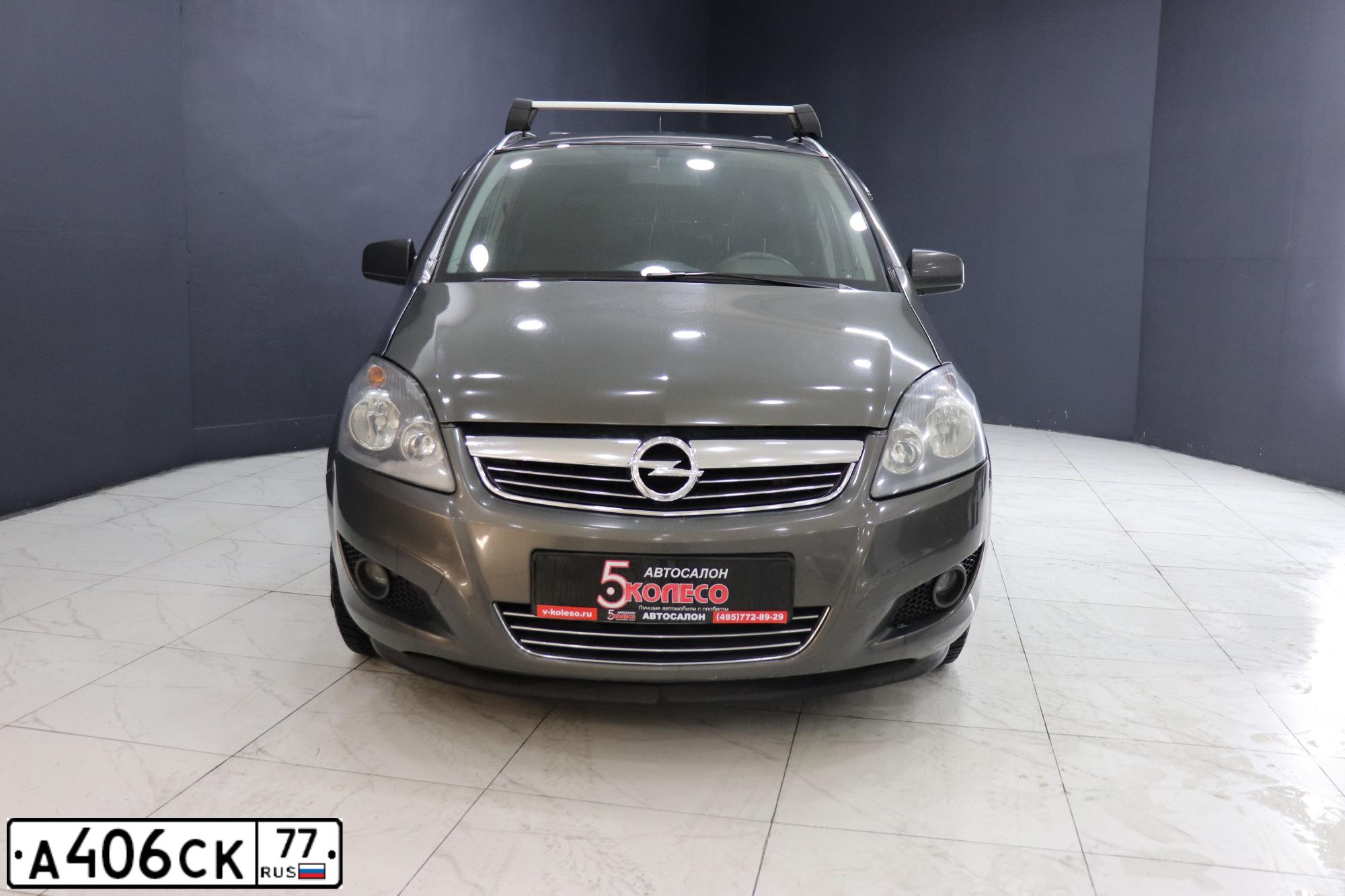 Фото автомобиля OPEL ZAFIRA, 2012 — госномер В656СК01. Цвет: СЕРЫЙ