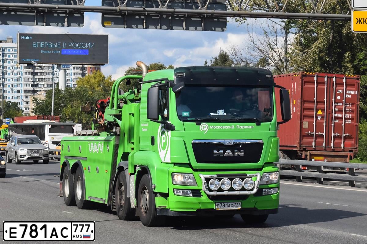 Фото автомобиля MAN TGX 41.XXX /8X4/, 2013 — госномер Е781АС777. Цвет: ЗЕЛЕНЫЙ