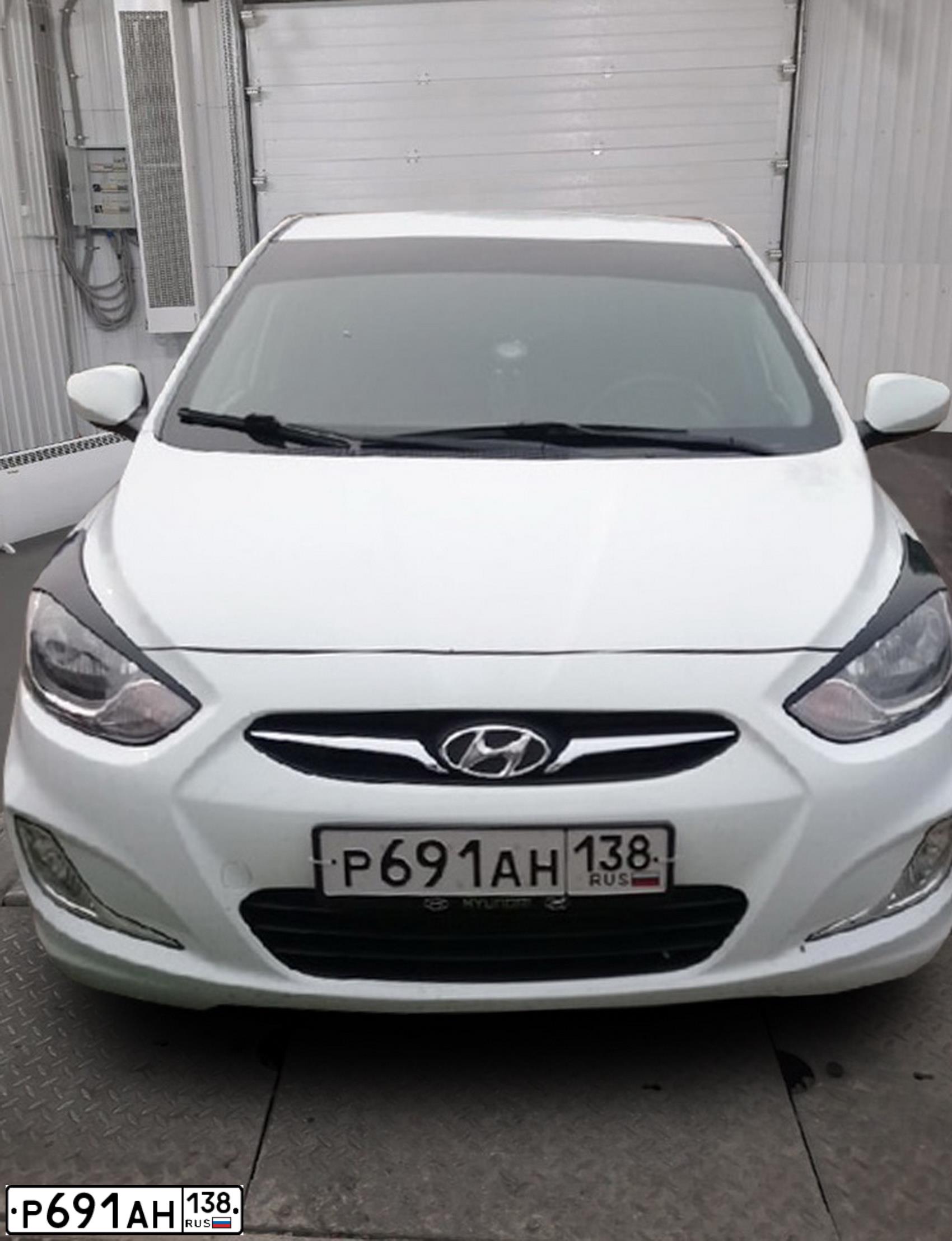 Фото автомобиля HYUNDAI SOLARIS, 2014 — госномер Е487НВ138. Цвет: Белый