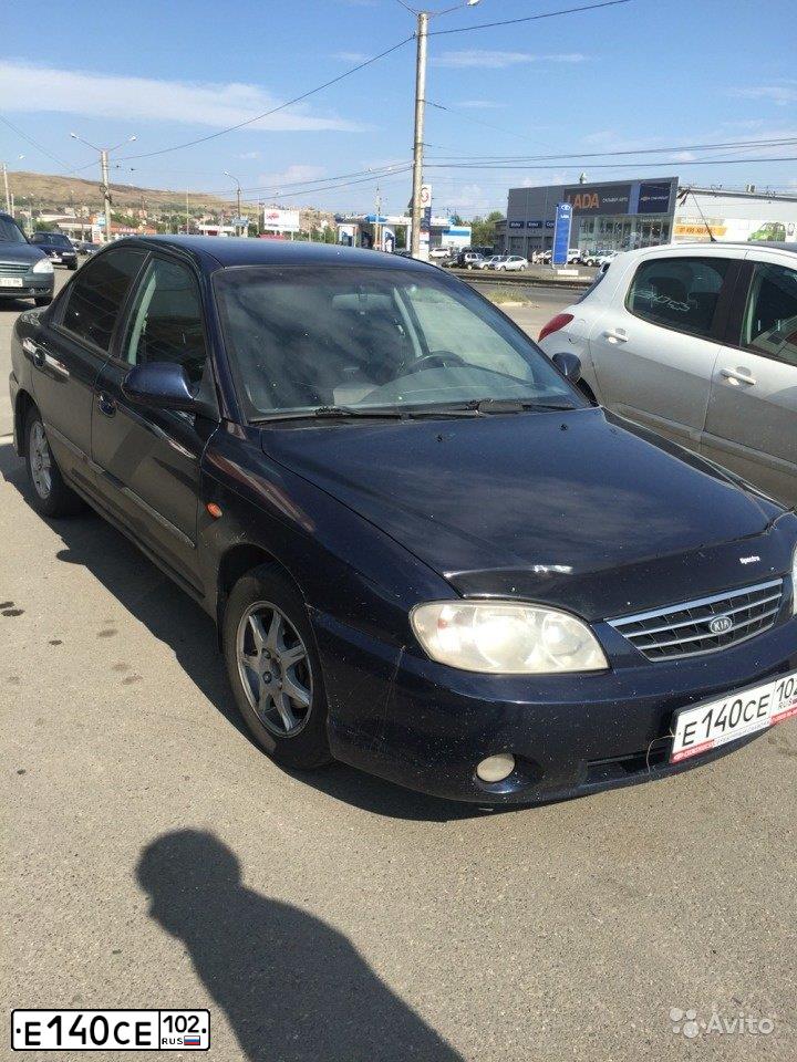 Фото автомобиля KIA SPECTRA, 2008 — госномер Е140СЕ102. Цвет: ТЕМНО-СИНИЙ