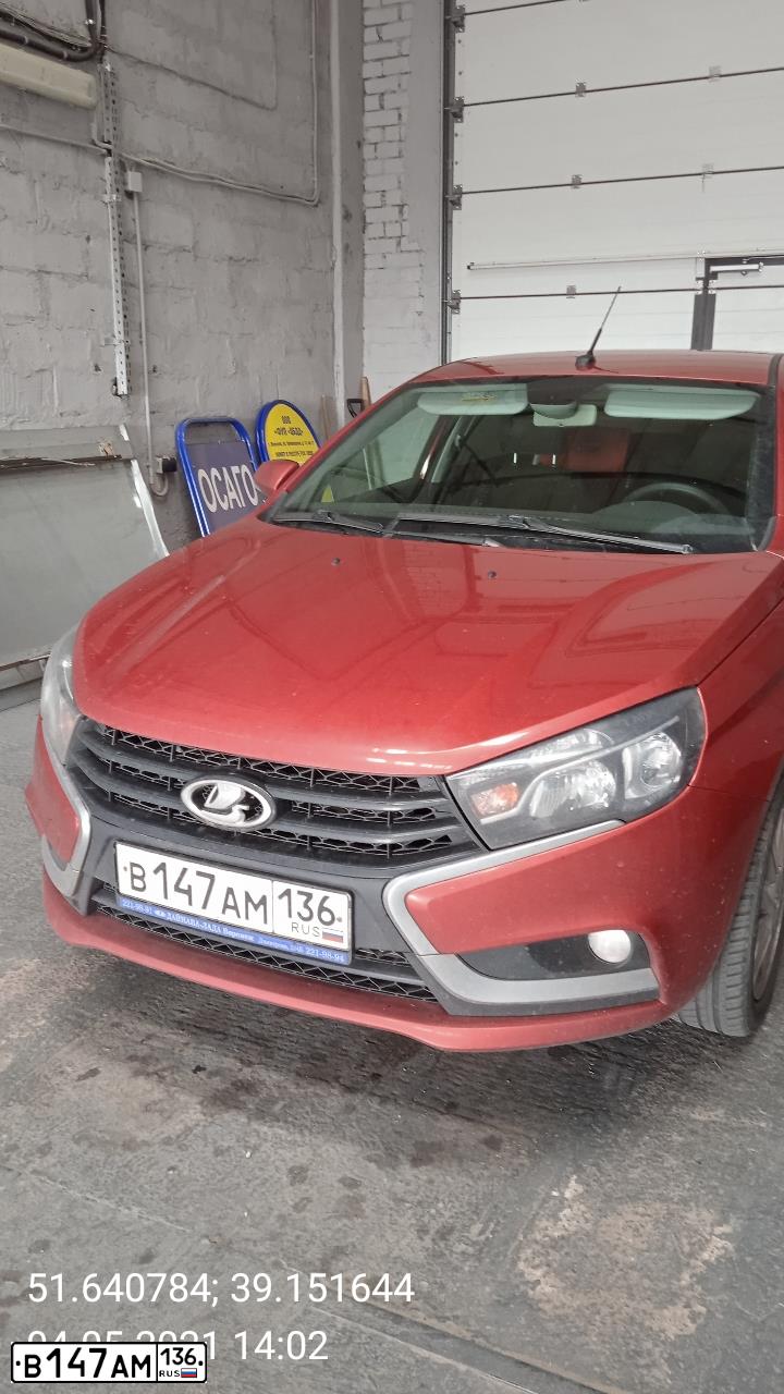 Фото автомобиля LADA VESTA, 2016 — госномер В147АМ136. Цвет: КРАСНЫЙ