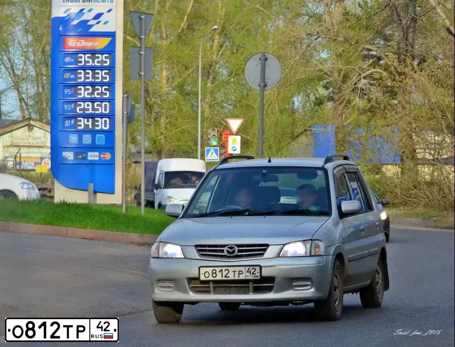 Фото автомобиля MAZDA DEMIO, 2001 — госномер Н528ВК70