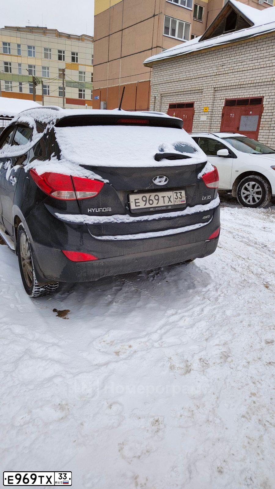 Фото автомобиля HYUNDAI IX35, 2012 — госномер Е969ТХ33. Цвет: ЧЕРНЫЙ