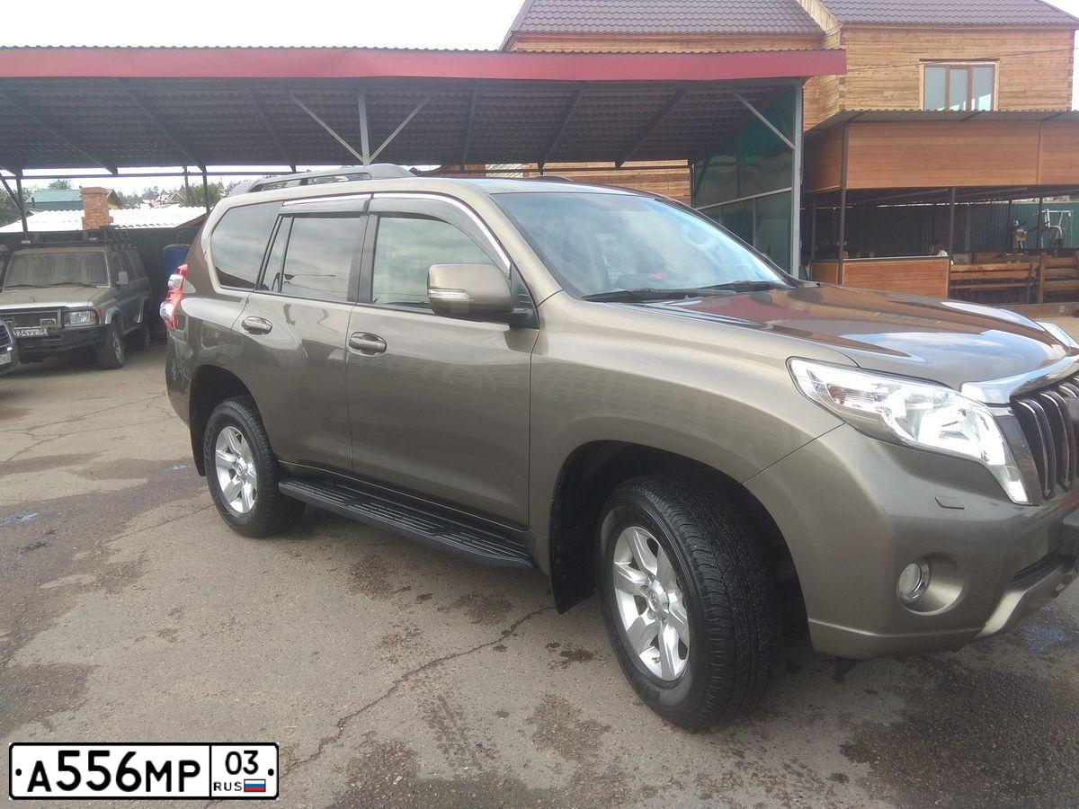 Фото автомобиля TOYOTA LANDCRUISER, 2015 — госномер К042ВВ53. Цвет: бронзовый