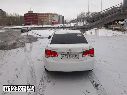 Фото автомобиля CHEVROLET CRUZE, 2012 — госномер С251АУ196. Цвет: Белый