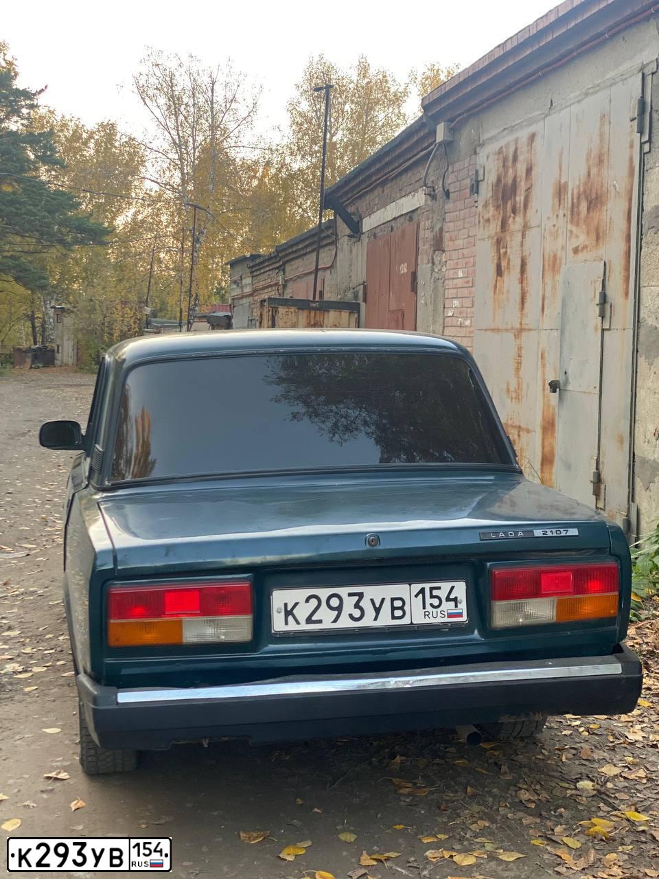 Фото автомобиля LADA 2107, 2007 — госномер К293УВ154. Цвет: Темно-зеленый