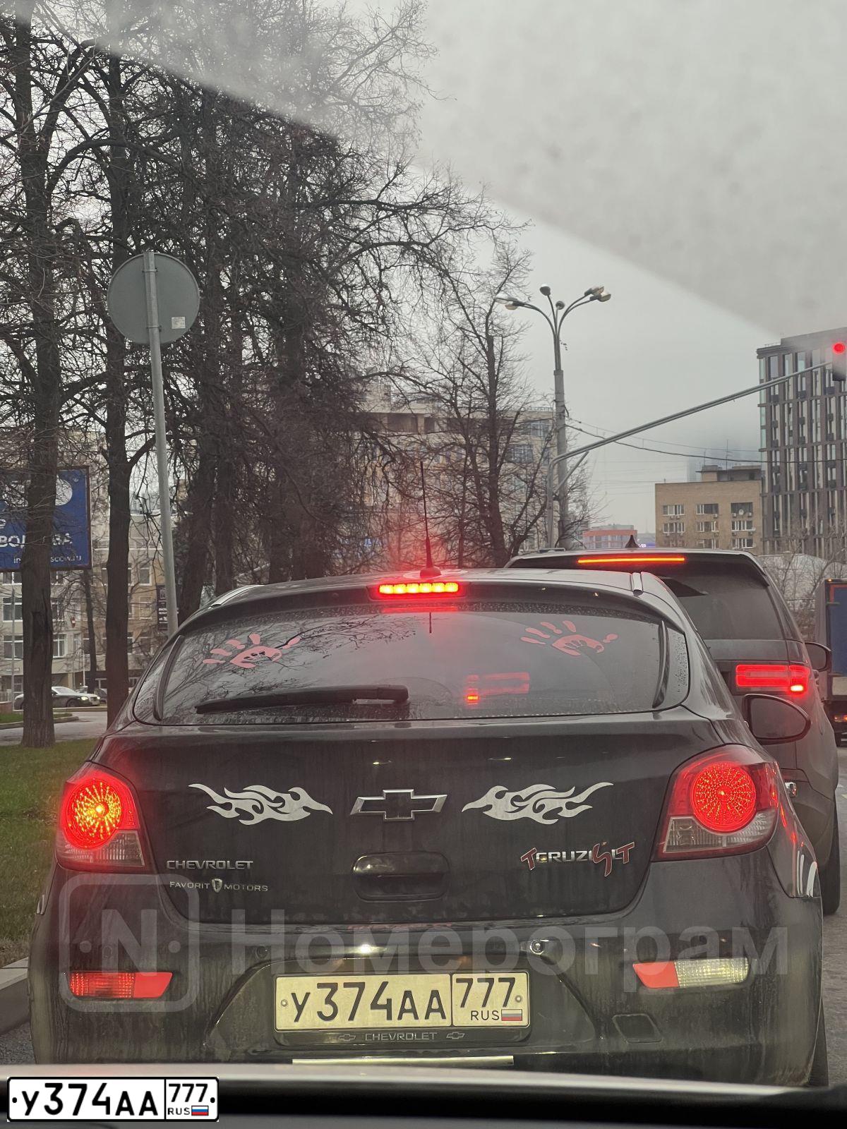 Фото автомобиля CHEVROLET CRUZE, 2012 — госномер У374АА777. Цвет: ЧЕРНЫЙ