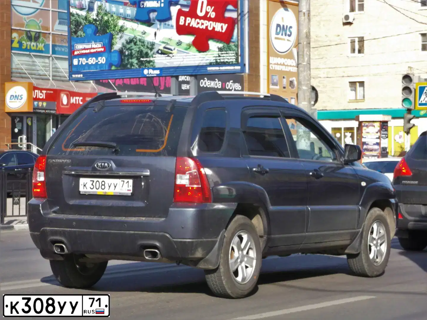 Фото автомобиля KIA SPORTAGE, 2009 — госномер К308УУ71. Цвет: СЕРЫЙ