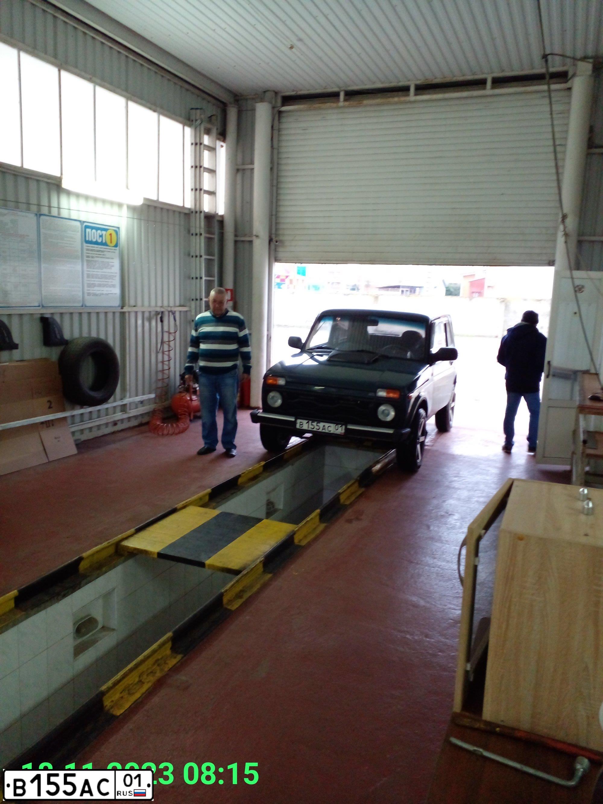 Фото автомобиля LADA 2121 NIVA, 2008 — госномер В155АС01. Цвет: Темно-зеленый