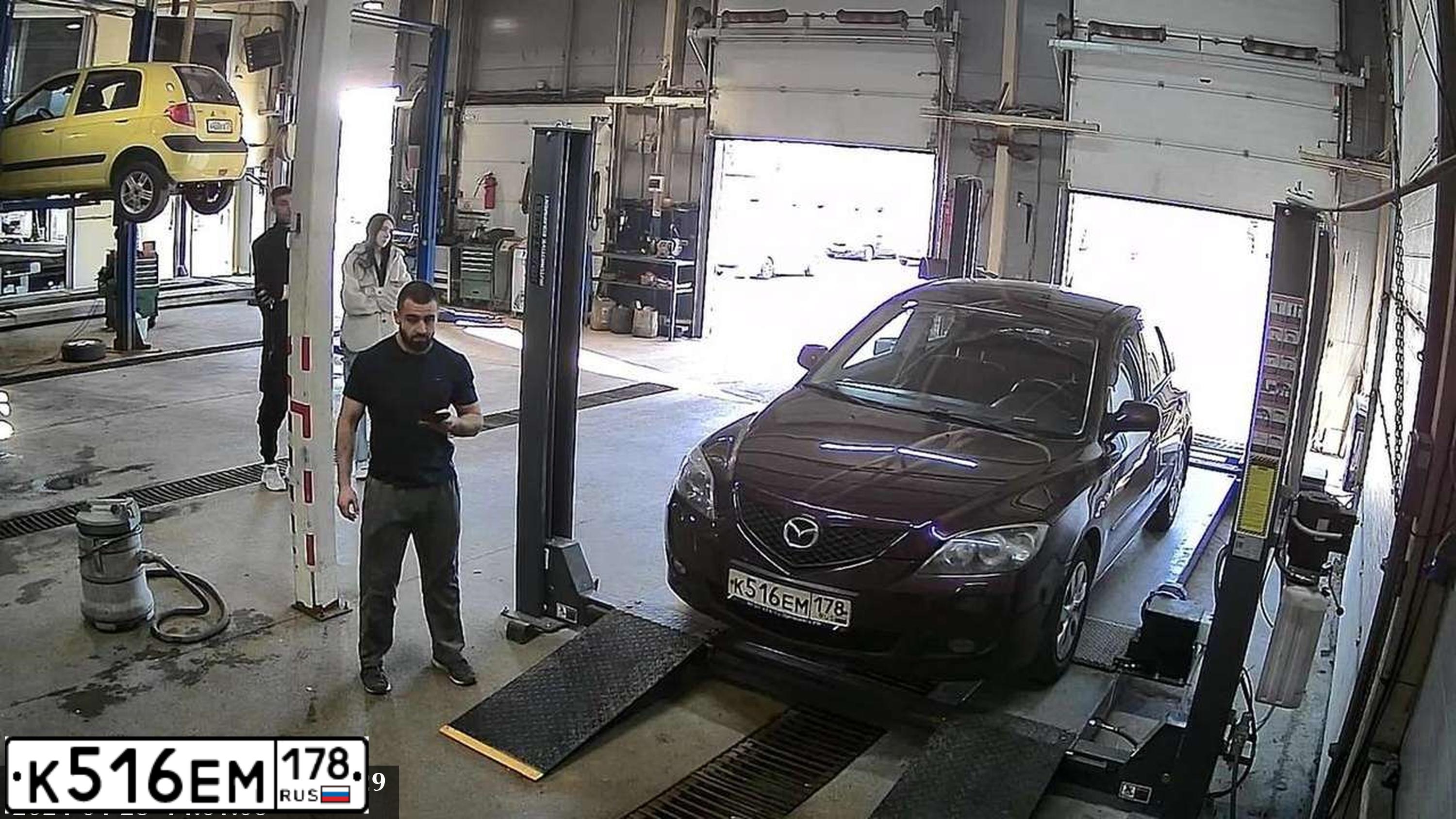 Фото автомобиля MAZDA 3, 2007 — госномер К516ЕМ178. Цвет: ТЕМНО-ВИШНЕВЫЙ