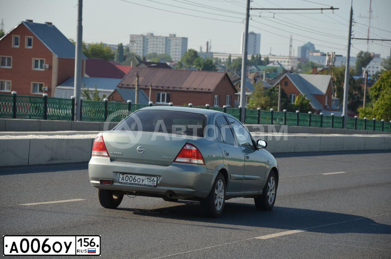 Фото автомобиля NISSAN ALMERA, 2006 — госномер А006ОУ156. Цвет: СЕРО-ЗЕЛЕНЫЙ