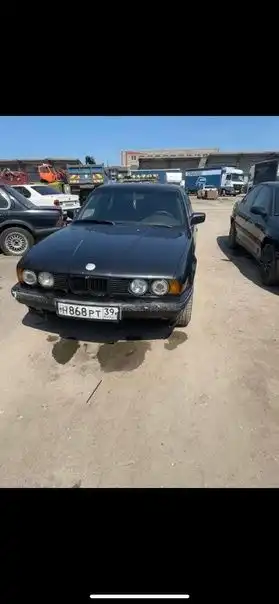 Фото автомобиля BMW SERIE 5, 1990 — госномер Т826НН39. Цвет: ЧЕРНЫЙ