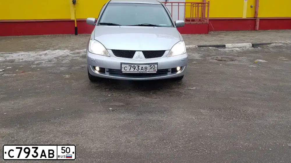 Фото автомобиля MITSUBISHI LANCER, 2005 — госномер С793АВ50. Цвет: СЕРЫЙ