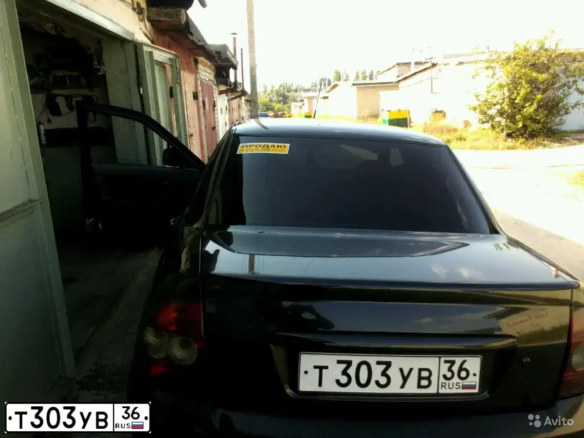 Фото автомобиля LADA 217030 LADA PRIORA, 2012 — госномер Н660УЕ33. Цвет: Сине-Черный