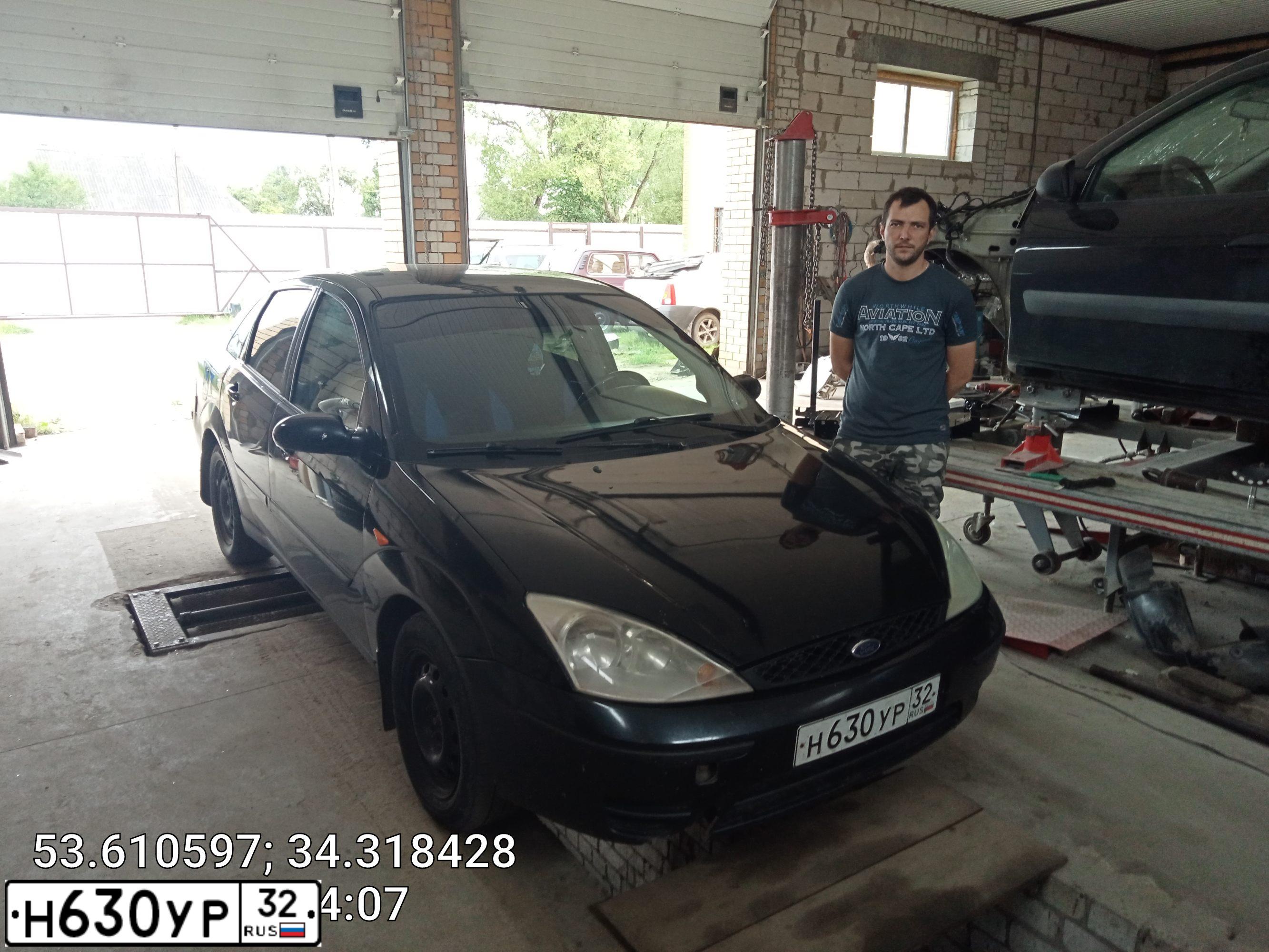 Фото автомобиля FORD FOCUS, 2004 — госномер Р021УА40. Цвет: ЧЕРНЫЙ