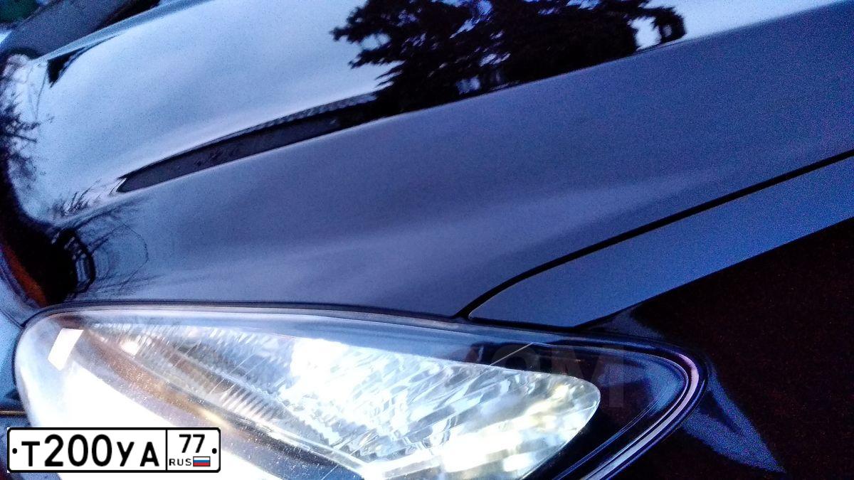 Фото автомобиля OPEL MOKKA, 2013 — госномер Т200УА77. Цвет: Коричневый