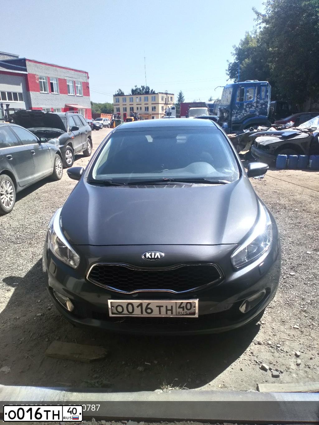 Фото автомобиля KIA CEE'D, 2013 — госномер О016ТН40. Цвет: Серый
