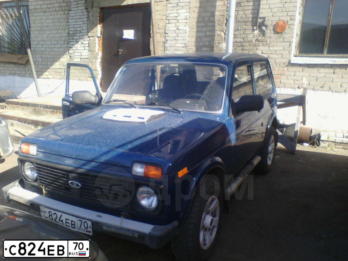 Фото автомобиля LADA 2121 NIVA, 2011 — госномер С824ЕВ70. Цвет: СИНЕ-ЗЕЛЕНЫЙ
