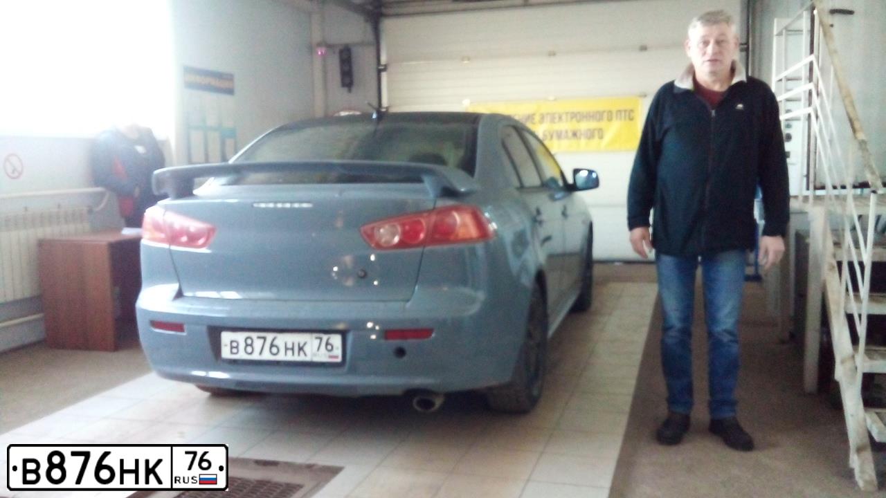 Фото автомобиля MITSUBISHI LANCER, 2007 — госномер В876НК76. Цвет: СЕРЫЙ
