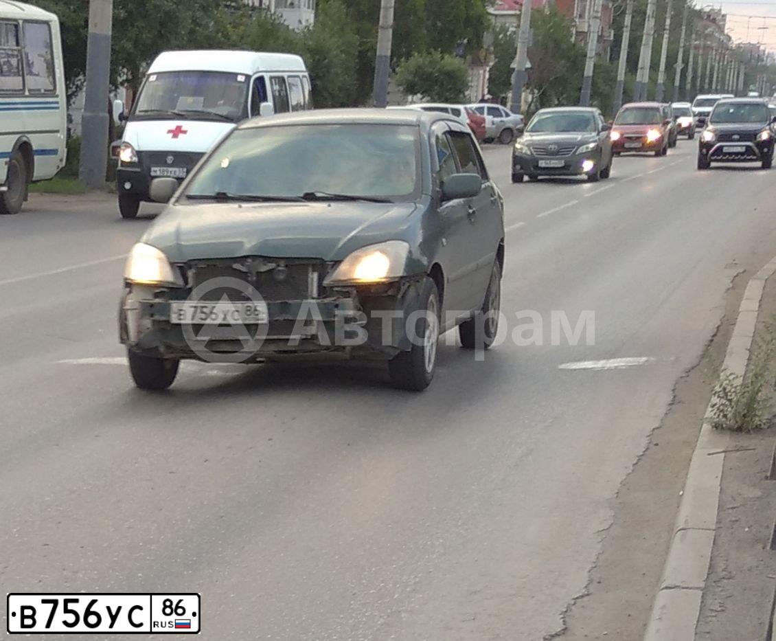 Фото автомобиля TOYOTA COROLLA, 2003 — госномер В756УС86. Цвет: ЗЕЛЕНЫЙ