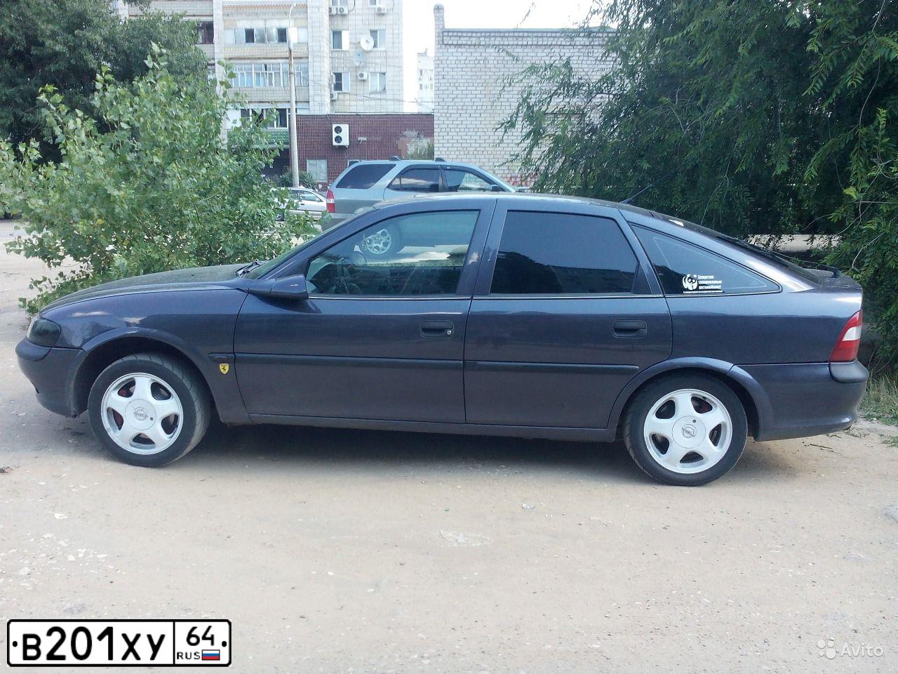 Фото автомобиля OPEL VECTRA, 1997 — госномер Т559ЕЕ136. Цвет: ФИОЛЕТОВЫЙ