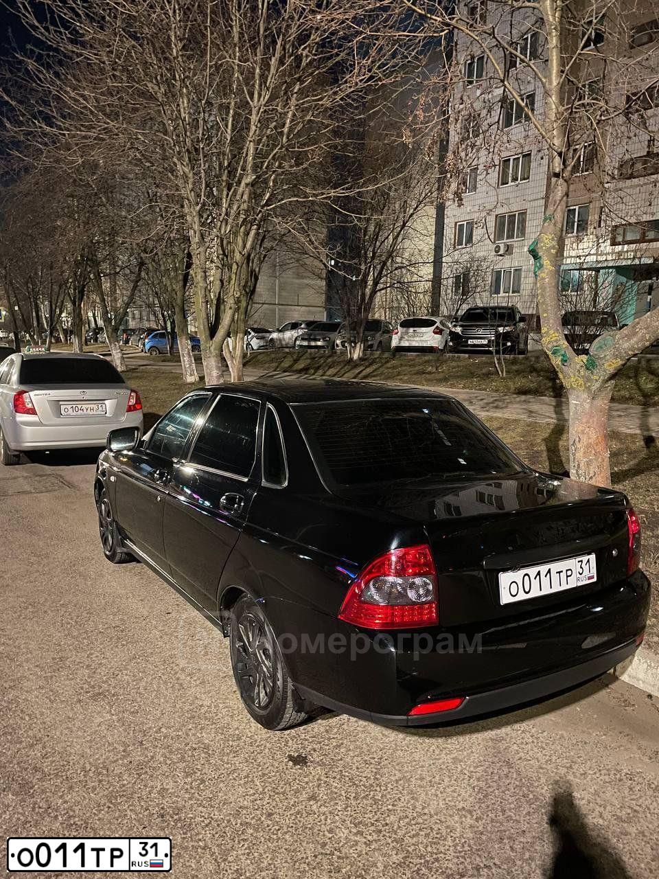 Фото автомобиля KIA RIO, 2018 — госномер О011ТР31. Цвет: Серый