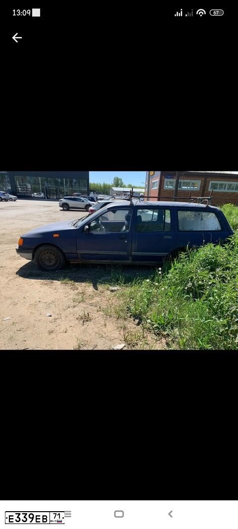 Фото автомобиля FORD SIERRA, 1988 — госномер Е339ЕВ71. Цвет: синий
