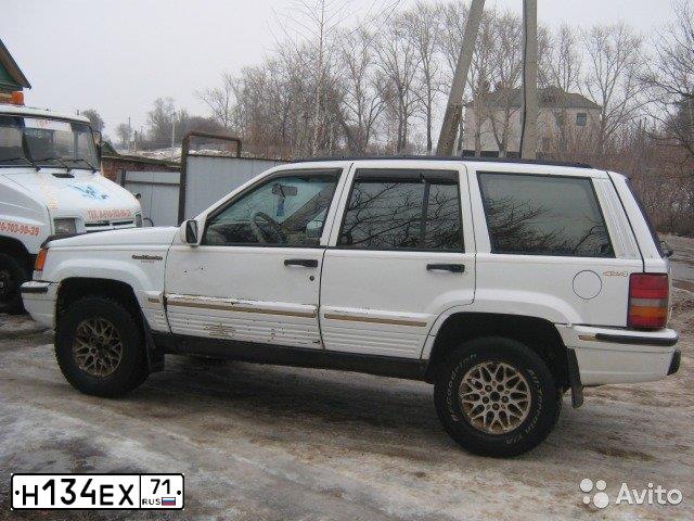 Фото автомобиля JEEP GRAND CHEROKEE, 1994 — госномер Н134ЕХ71. Цвет: ЗЕЛЕНЫЙ