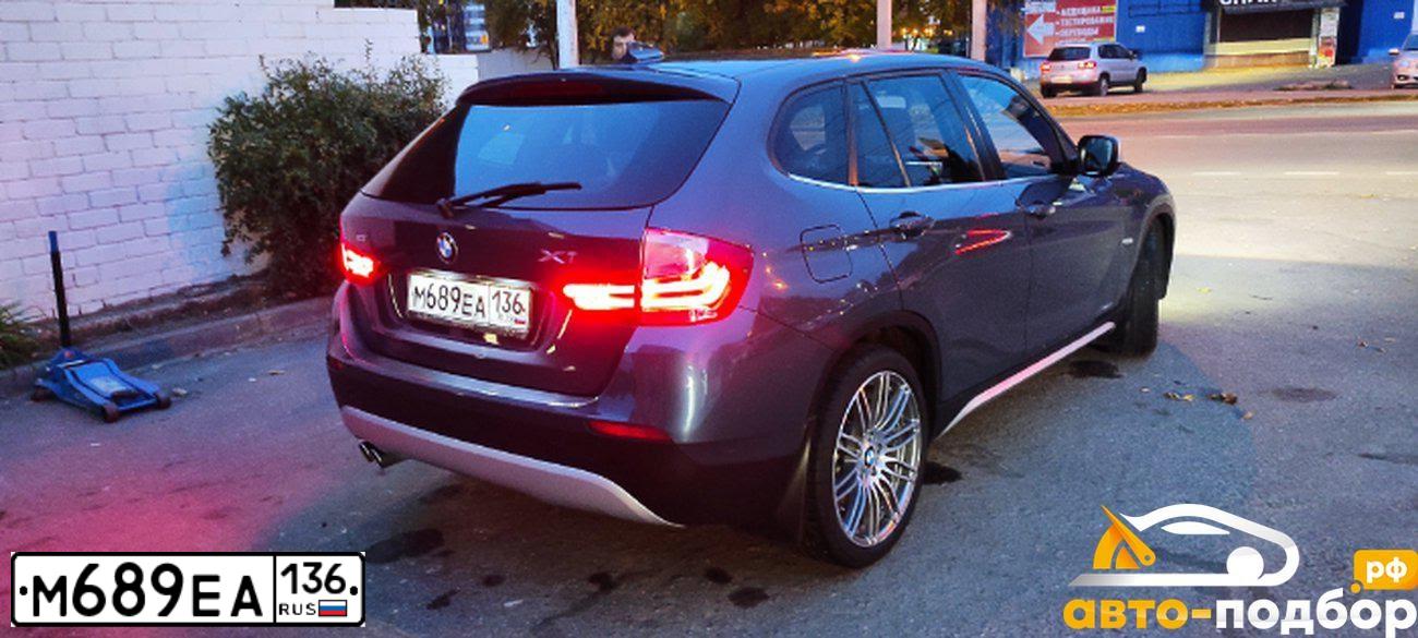 Фото автомобиля BMW X1, 2010 — госномер У043УМ69. Цвет: синий