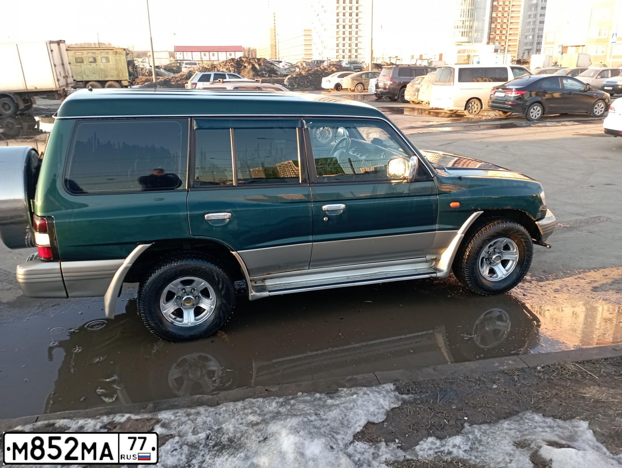 Фото автомобиля MITSUBISHI PAJERO, 1998 — госномер М265ТУ198. Цвет: ЗЕЛЕНЫЙ ТЕМНЫЙ МЕТАЛЛИК