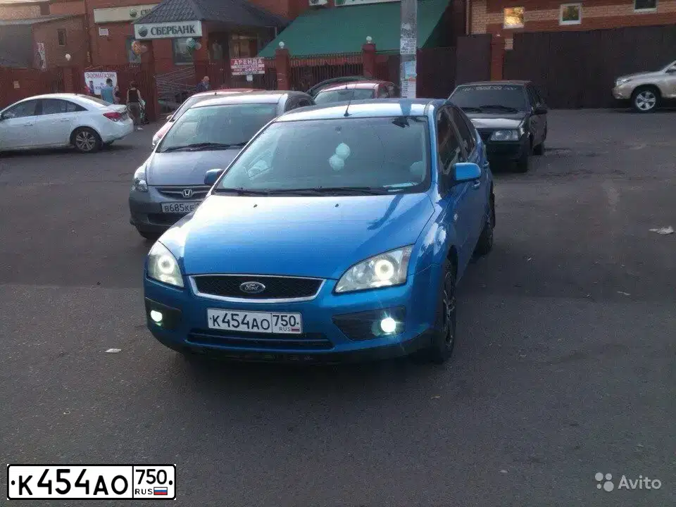 Фото автомобиля FORD FOCUS, 2006 — госномер О224УА69. Цвет: голубой