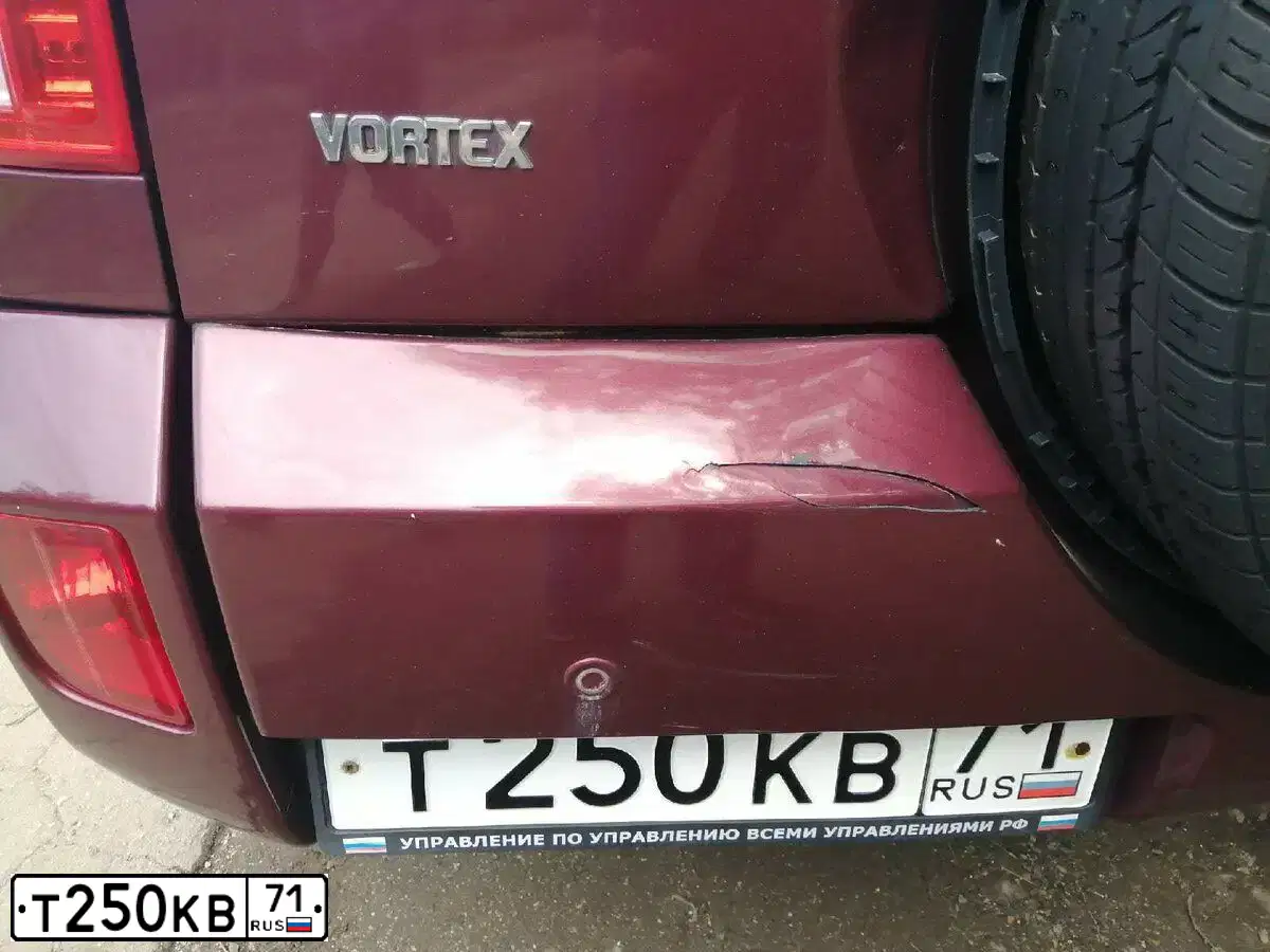 Фото автомобиля TAGAZ TINGO, 2012 — госномер Т250КВ71. Цвет: Красный