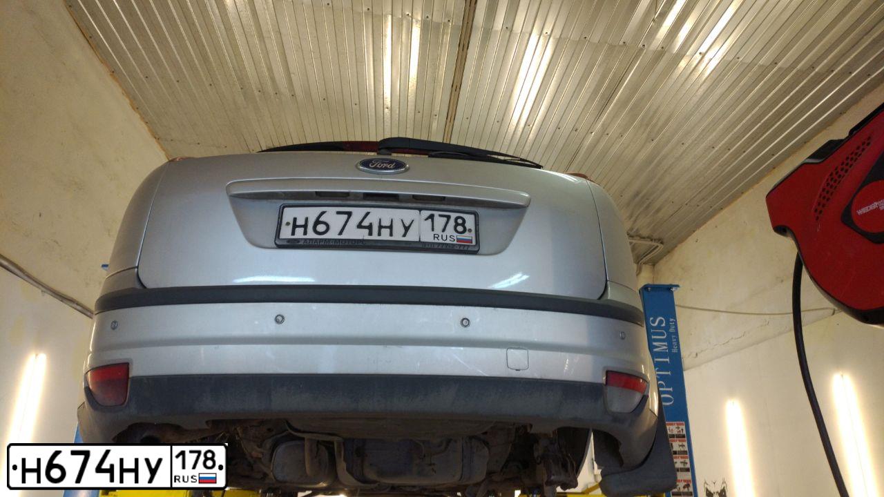 Фото автомобиля FORD FOCUS, 2007 — госномер Е576КУ08. Цвет: Серебристый