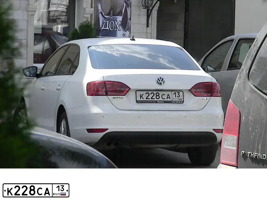 Фото автомобиля VOLKSWAGEN JETTA, 2014 — госномер К228СА13. Цвет: БЕЛЫЙ
