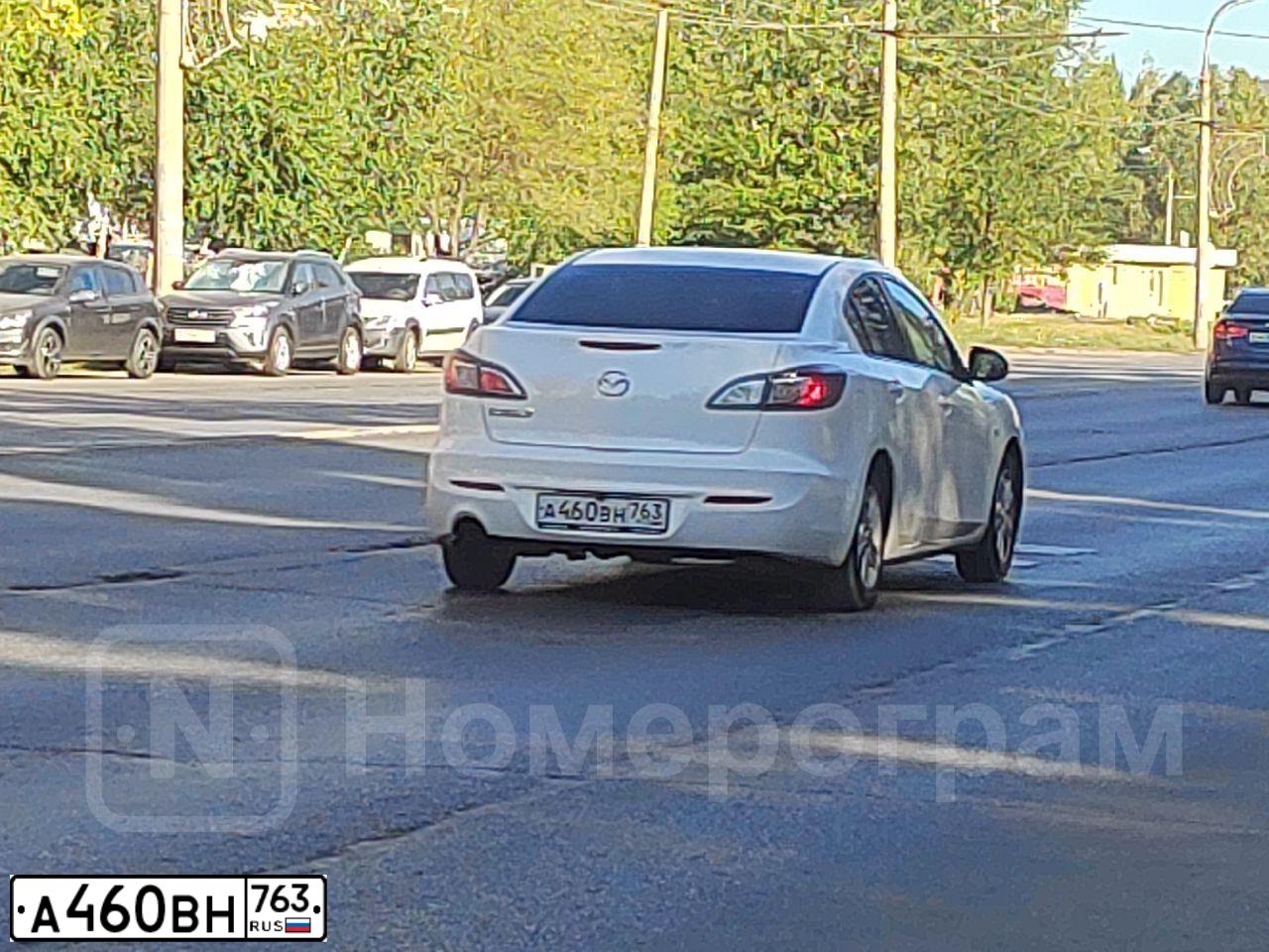 Фото автомобиля MAZDA 3, 2011 — госномер К153ТЕ702. Цвет: Белый