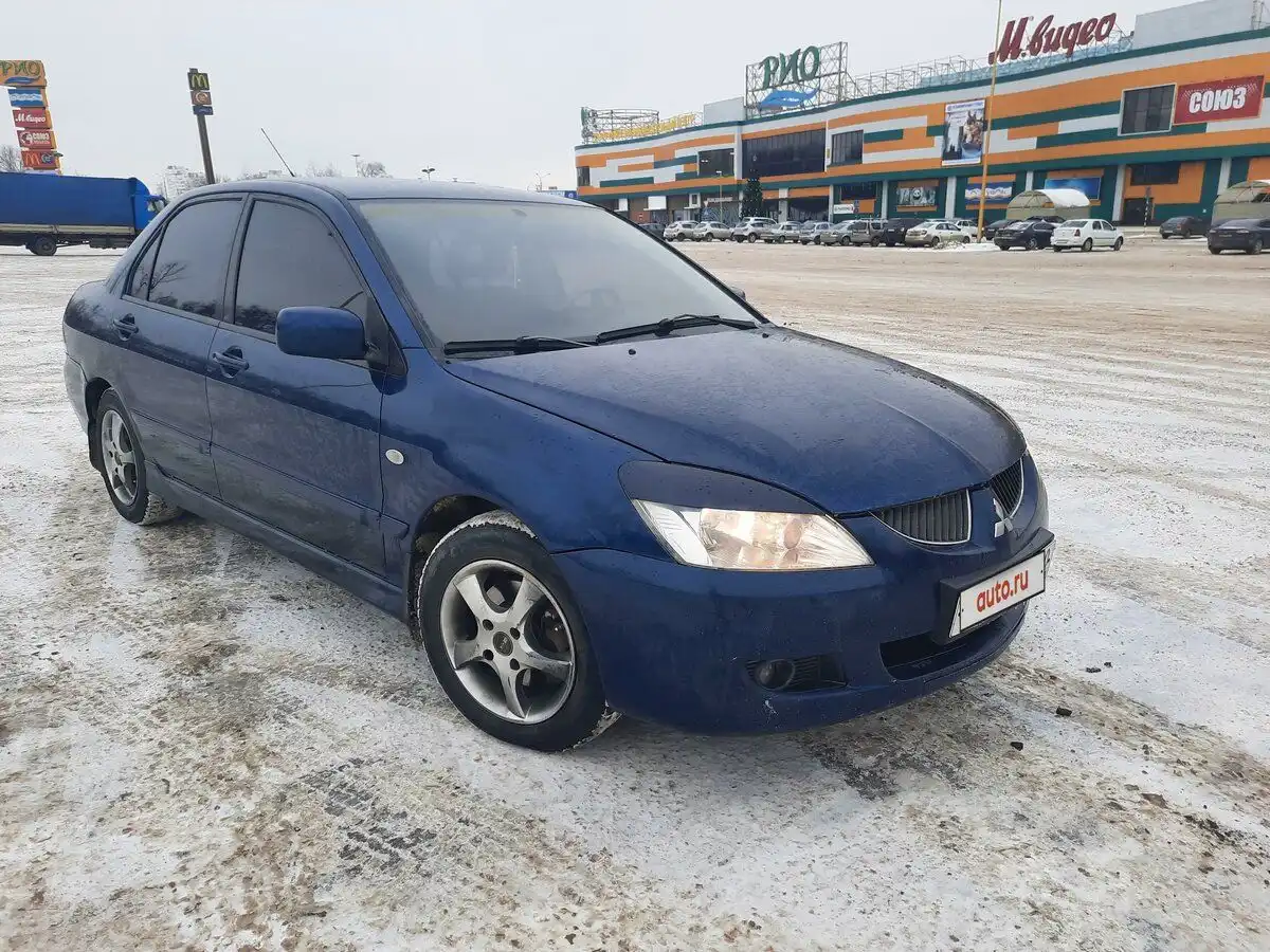 Фото автомобиля MITSUBISHI LANCER, 2005 — госномер С654РЕ40