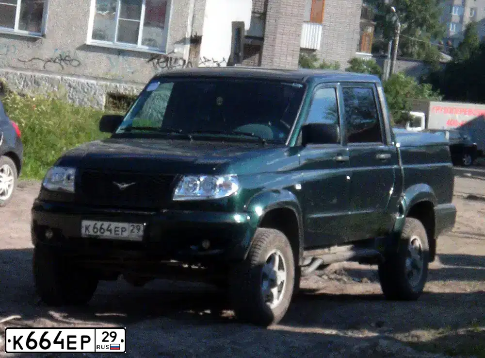 Фото автомобиля UAZ 2363 PICKUP, 2011 — госномер К664ЕР29. Цвет: ЗЕЛЕНЫЙ