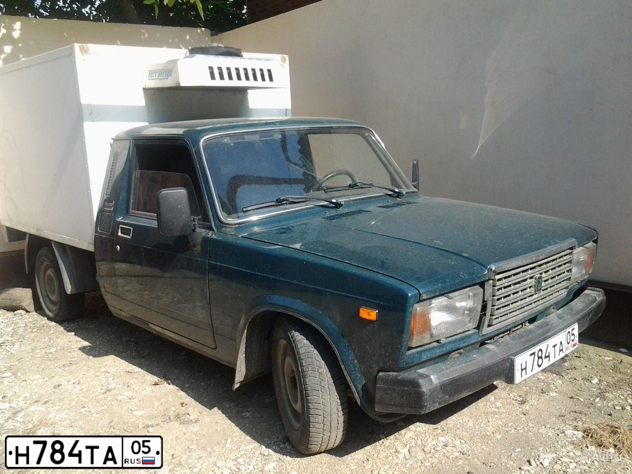 Фото автомобиля LADA 2345 WIS, 2008 — госномер К998НМ199. Цвет: ТЕМНО-ЗЕЛЕНЫЙ