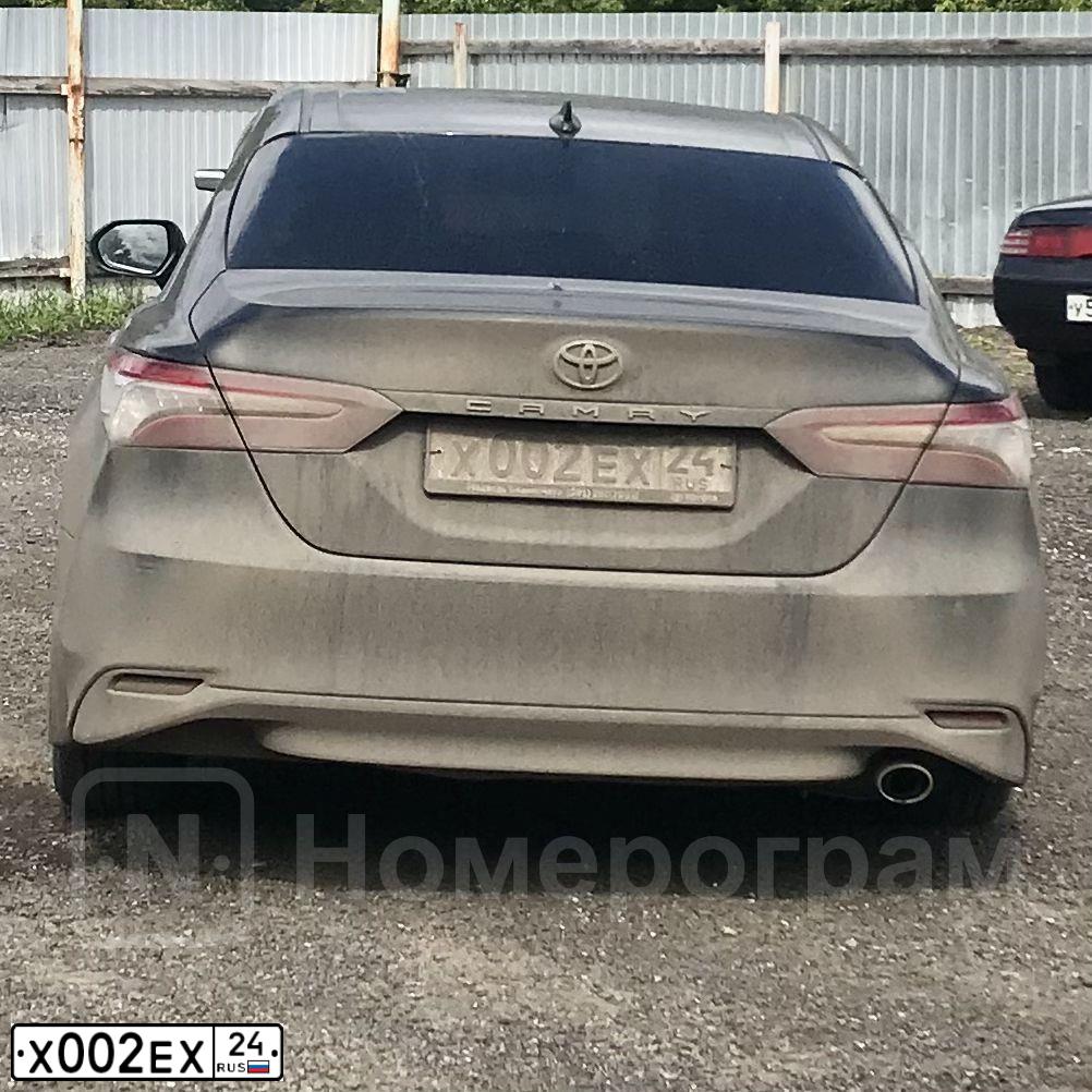 Фото автомобиля GAZ 3110 WOLGA, 1999 — госномер Х002ЕХ24. Цвет: Белый