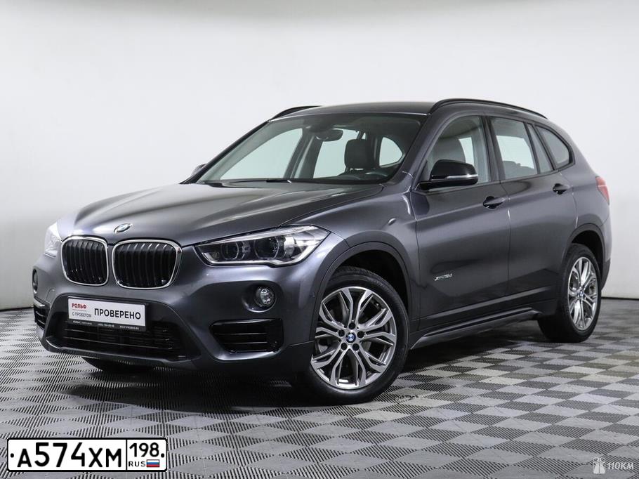 Фото автомобиля BMW X1, 2018 — госномер В145СТ124. Цвет: СЕРЫЙ МЕТАЛЛИК