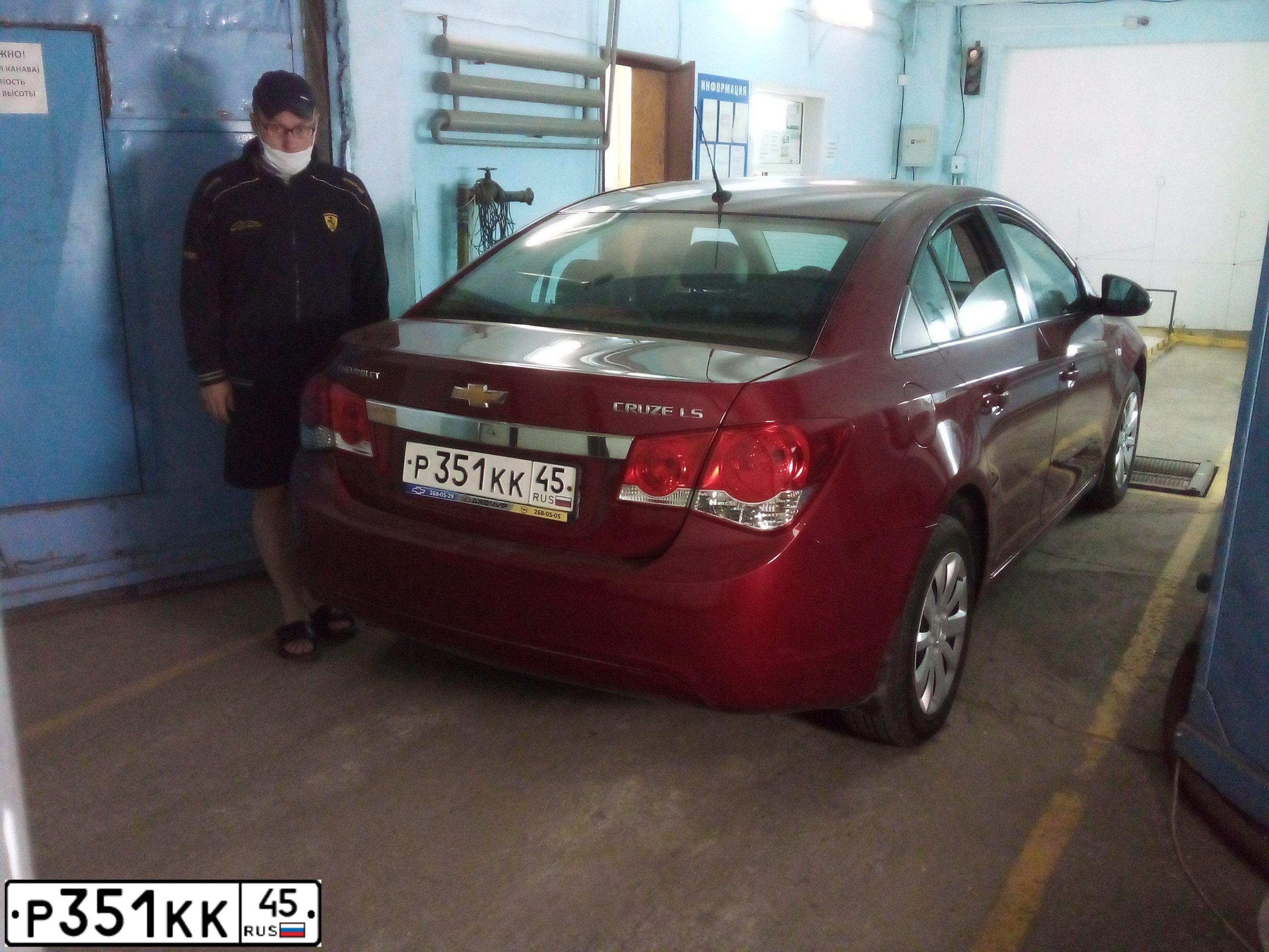 Фото автомобиля CHEVROLET CRUZE, 2011 — госномер С977НЕ45. Цвет: ТЕМНО-КРАСНЫЙ МЕТАЛЛИК