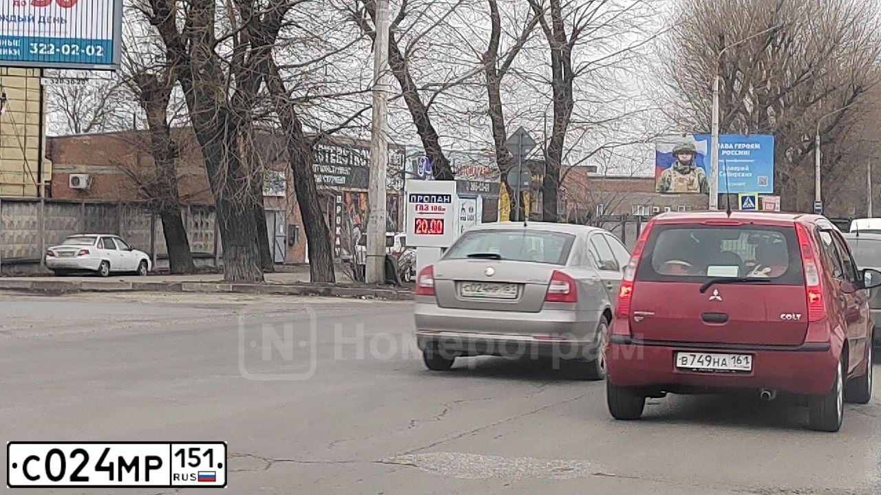 Фото автомобиля MITSUBISHI LANCER, 2008 — госномер Т275ЕР180. Цвет: Красный