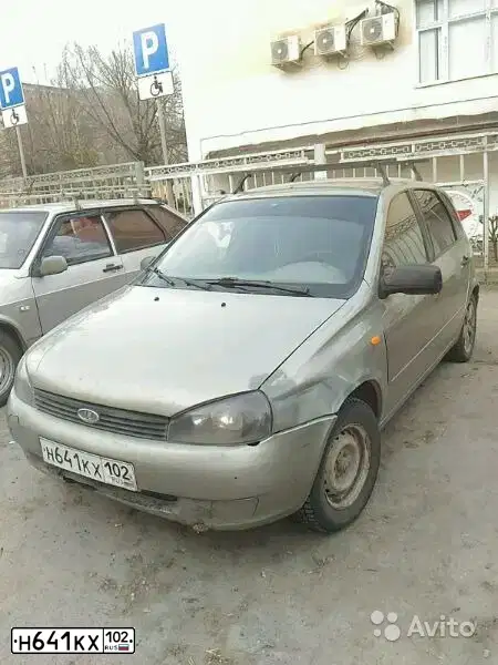Фото автомобиля LADA 1119 KALINA, 2012 — госномер Н641КХ102. Цвет: СЕРО-БЕЖЕВЫЙ