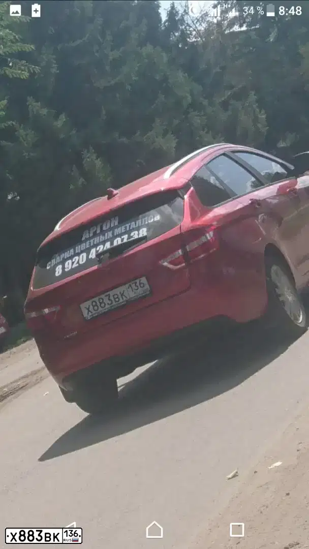 Фото автомобиля LADA VESTA, 2018 — госномер Х883ВК136. Цвет: Красный