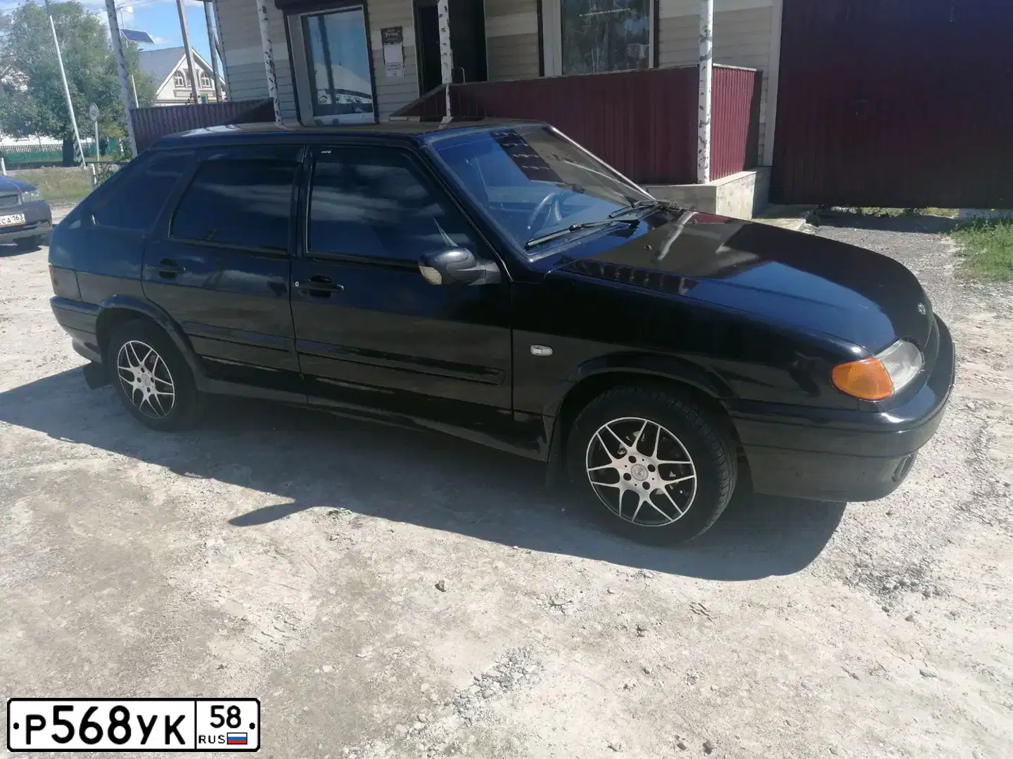 Фото автомобиля LADA 2114 SAMARA, 2011 — госномер Р568УК58. Цвет: Сине-Черный