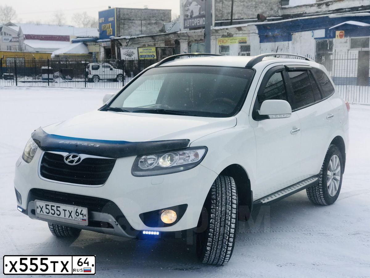 Фото автомобиля HYUNDAI SANTA FE, 2011 — госномер Х555ТХ64. Цвет: Белый