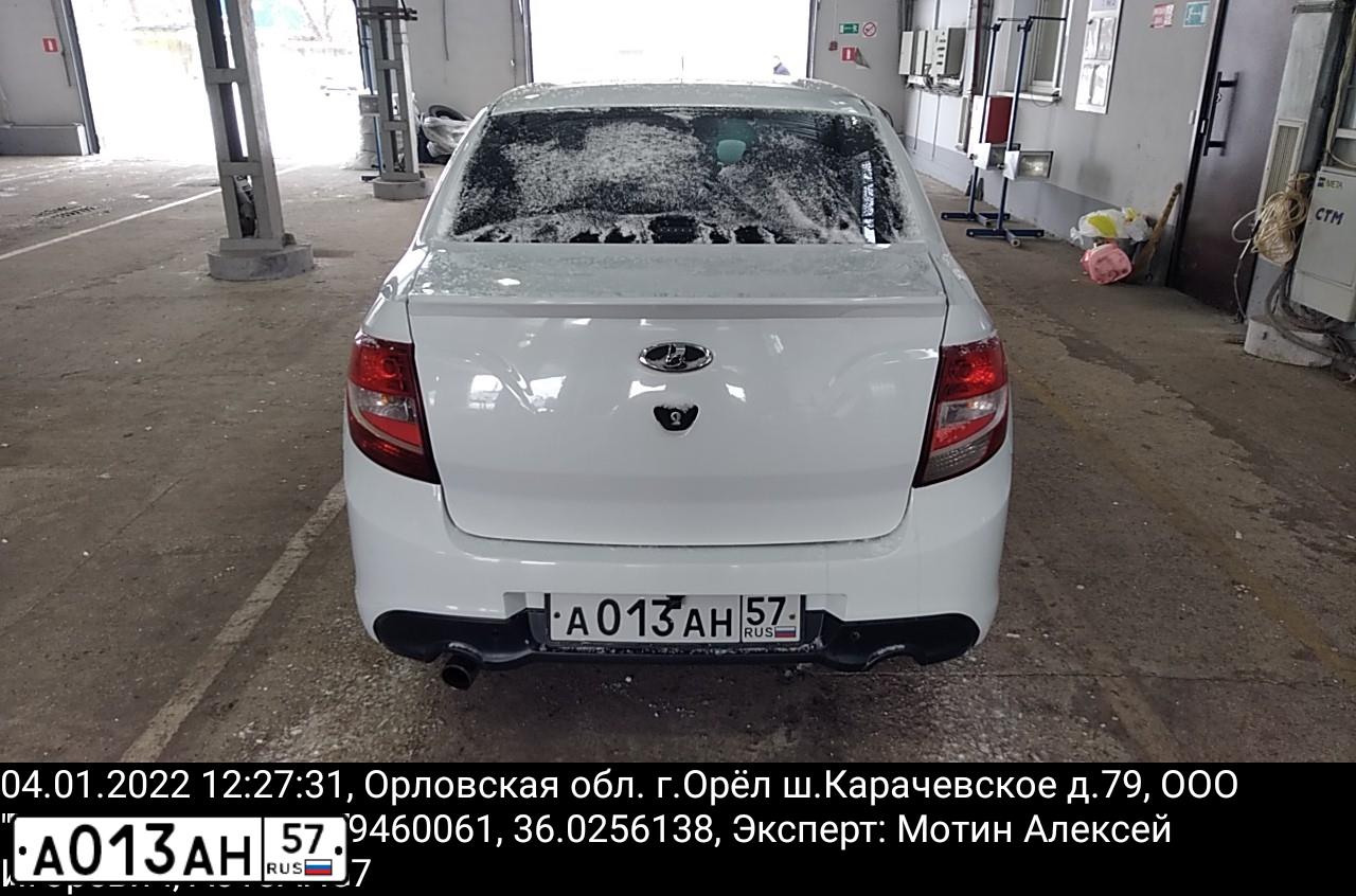 Фото автомобиля LADA 2190 GRANTA, 2014 — госномер А013АН57. Цвет: БЕЛЫЙ