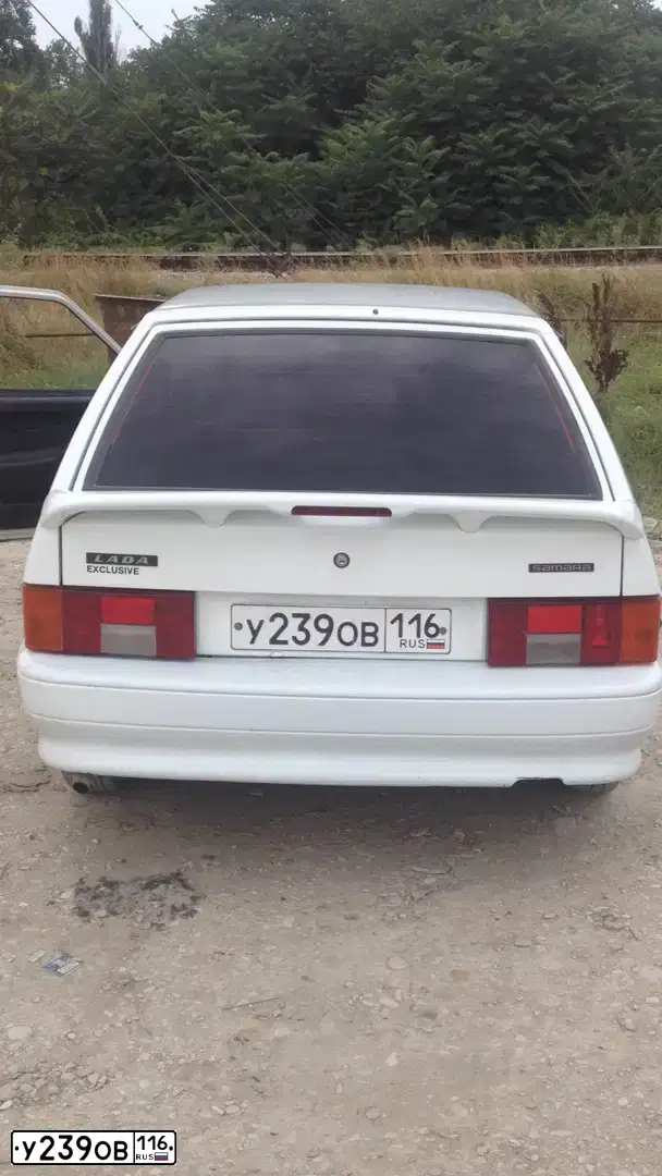Фото автомобиля LADA 2114, 2009 — госномер С040РУ05. Цвет: Белый